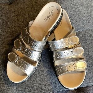 Brand New Clark collection slip on pewter shoes. Size 10